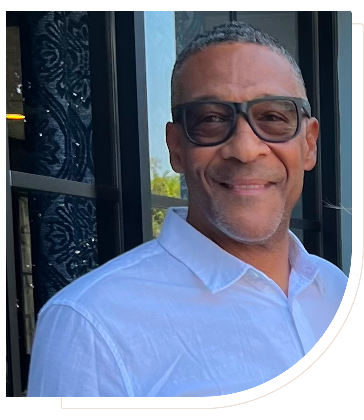 Happy man with short hair and glasses